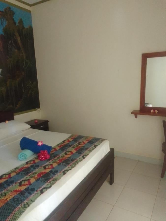 Kputra Homestay Amed Esterno foto