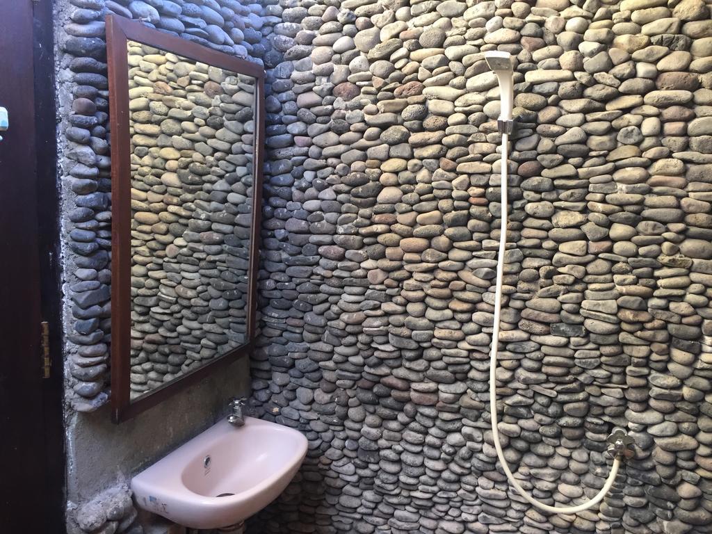 Kputra Homestay Amed Esterno foto